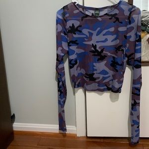 Long-sleeved top. Nylon/spandex. Size runs small